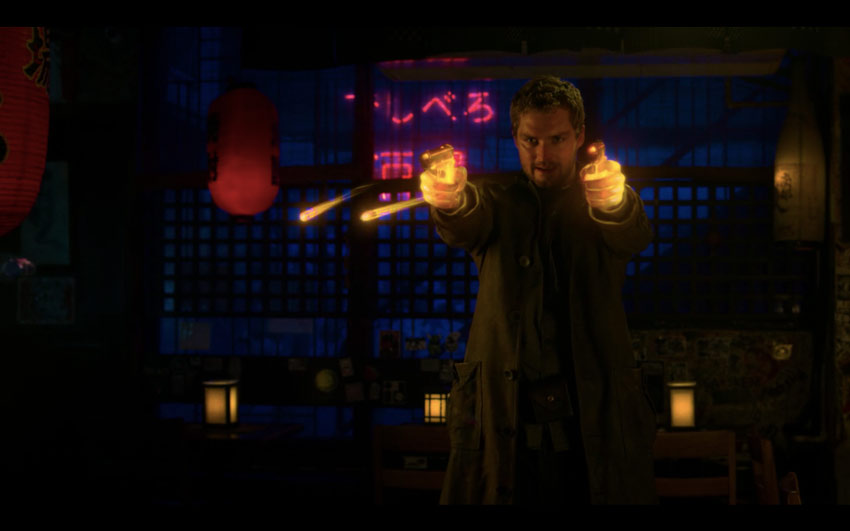 Danny Rand imparting the power of the Iron Fist upon two .45mm bullets