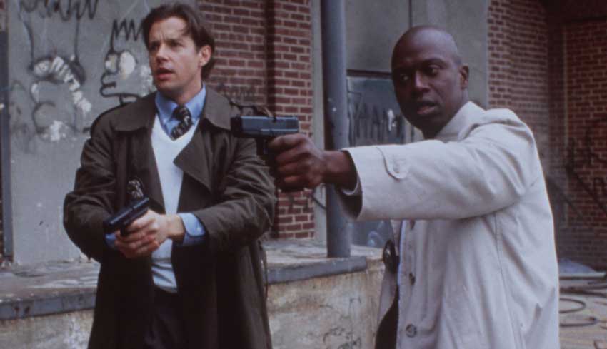 Tim Bayliss (Kyle Secor) and Frank Pembleton (Andre Braugher) in <em>Homicide: Life on the Street</em>.